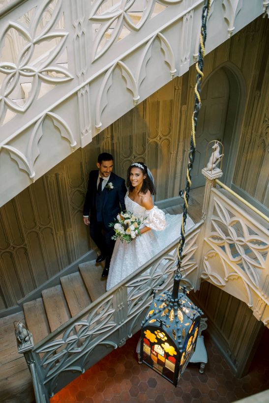 Bride and Groom going down gothic staircase at strawberry hill house